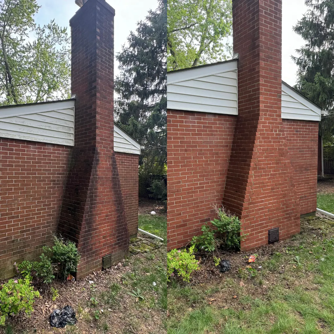 Brick siding and chimney cleaned, removing years of algae from this home in Marysville, Ohio